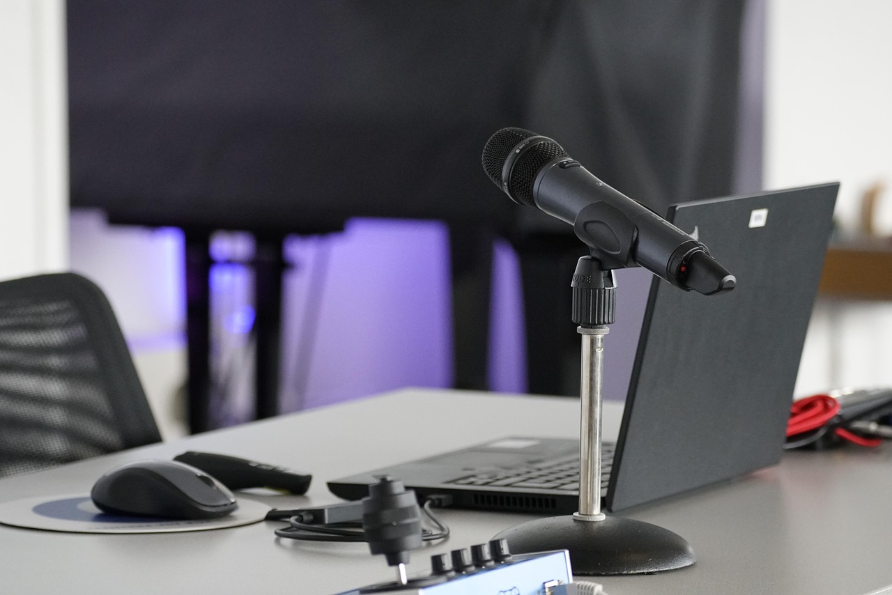Laptop, conference table, mouse — How IPTV Sweden Provides Access to Local and International TV Content