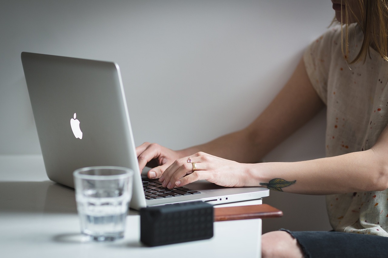 Laptop, apple, macbook — Set Up Atomic Wallet Easily to Track and Control Your Assets